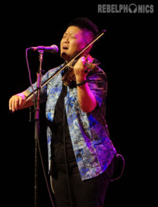 Photo: Annie Govekar. 6/12/23 - Lyris Hung performs with the Indigo Girls at the Ryman Auditorium in Nashville, TN.